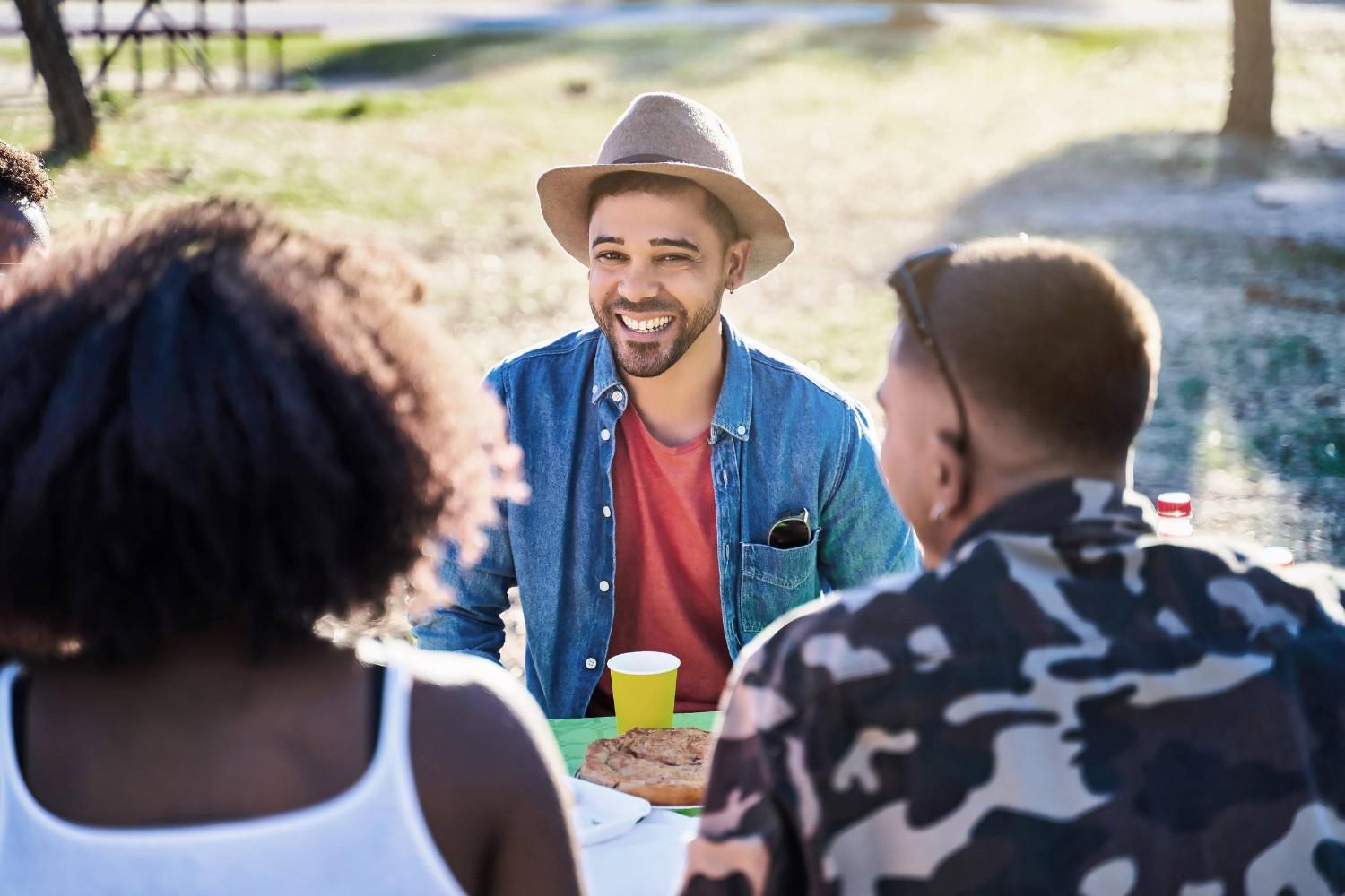 A group of friends enjoying a picnic together