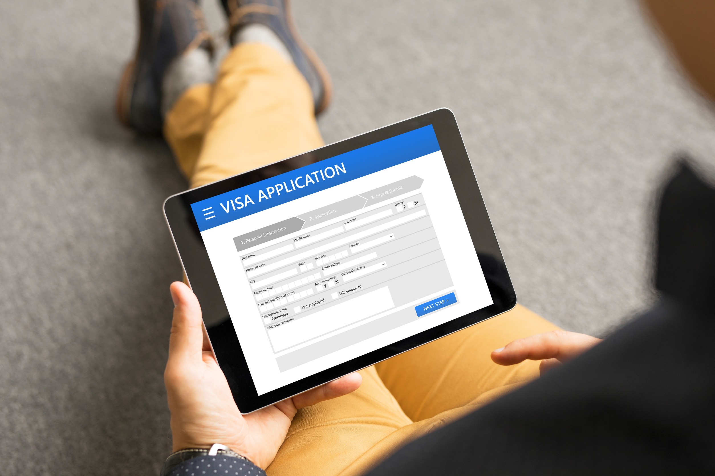 A Man Applying For An Evisa Online