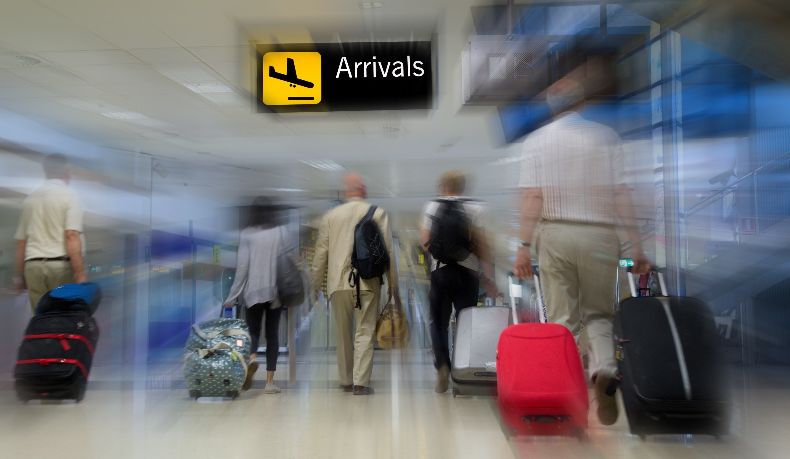 Airline Passengers In The Airport