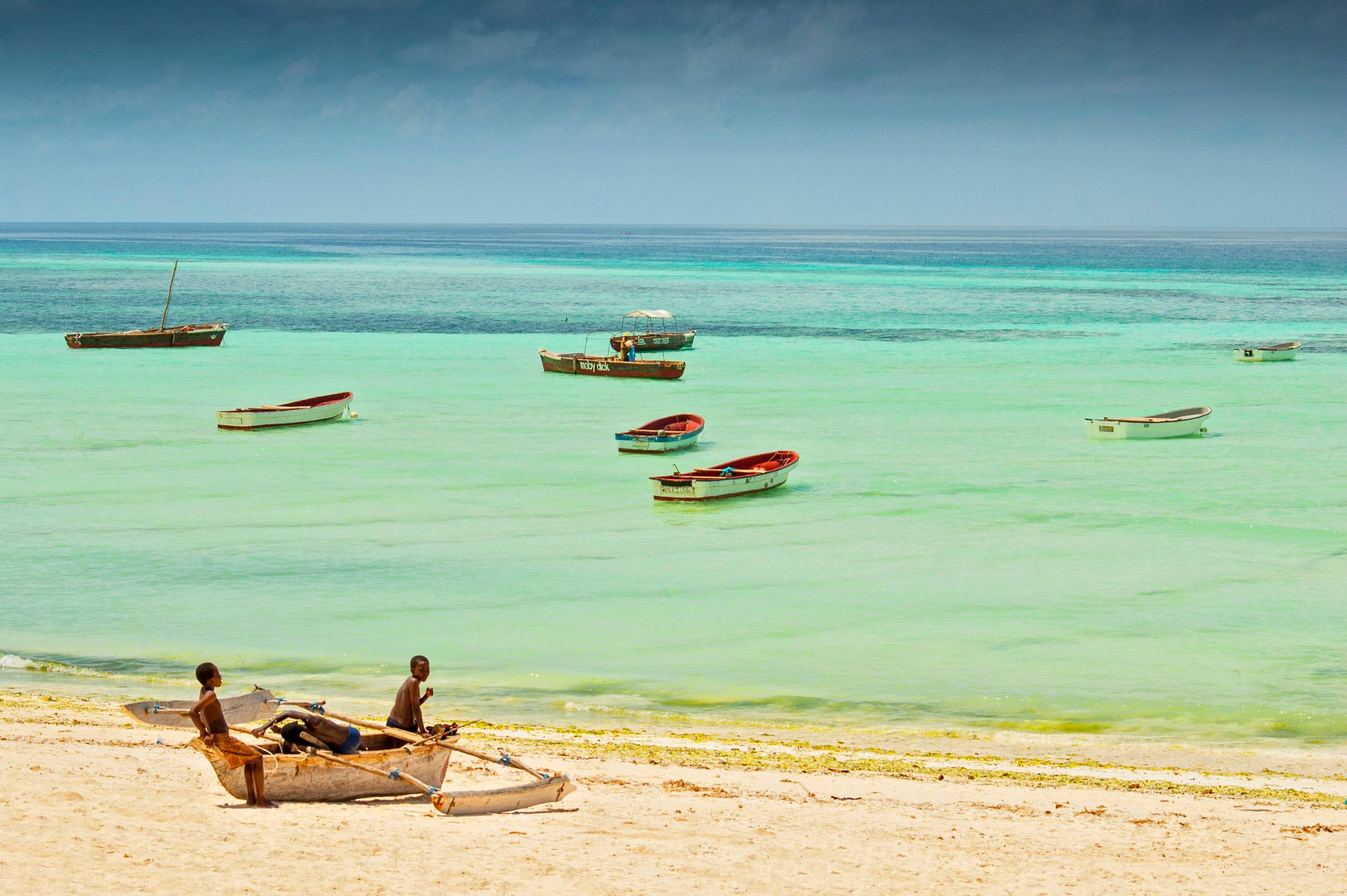 Fisherman Boats On The Beach Of Tropical Island Zanzibar Tanzania