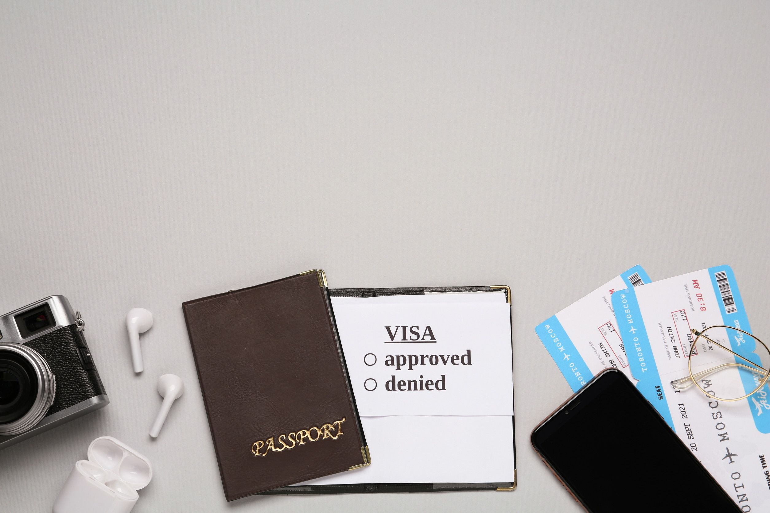 Flat Lay Composition With Passport Tickets And Earphones