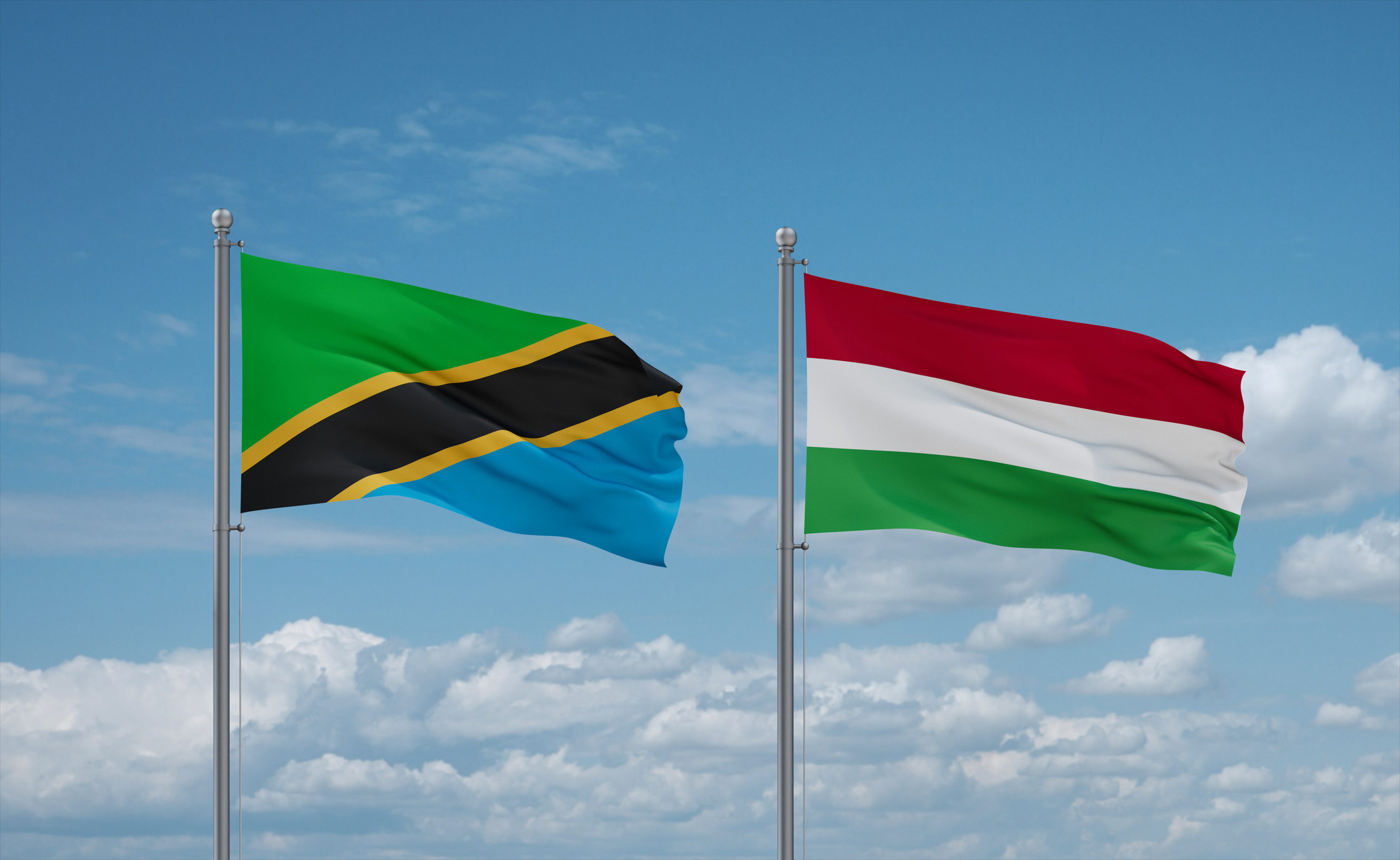 Hungary And Tanzania Flags Waving Together
