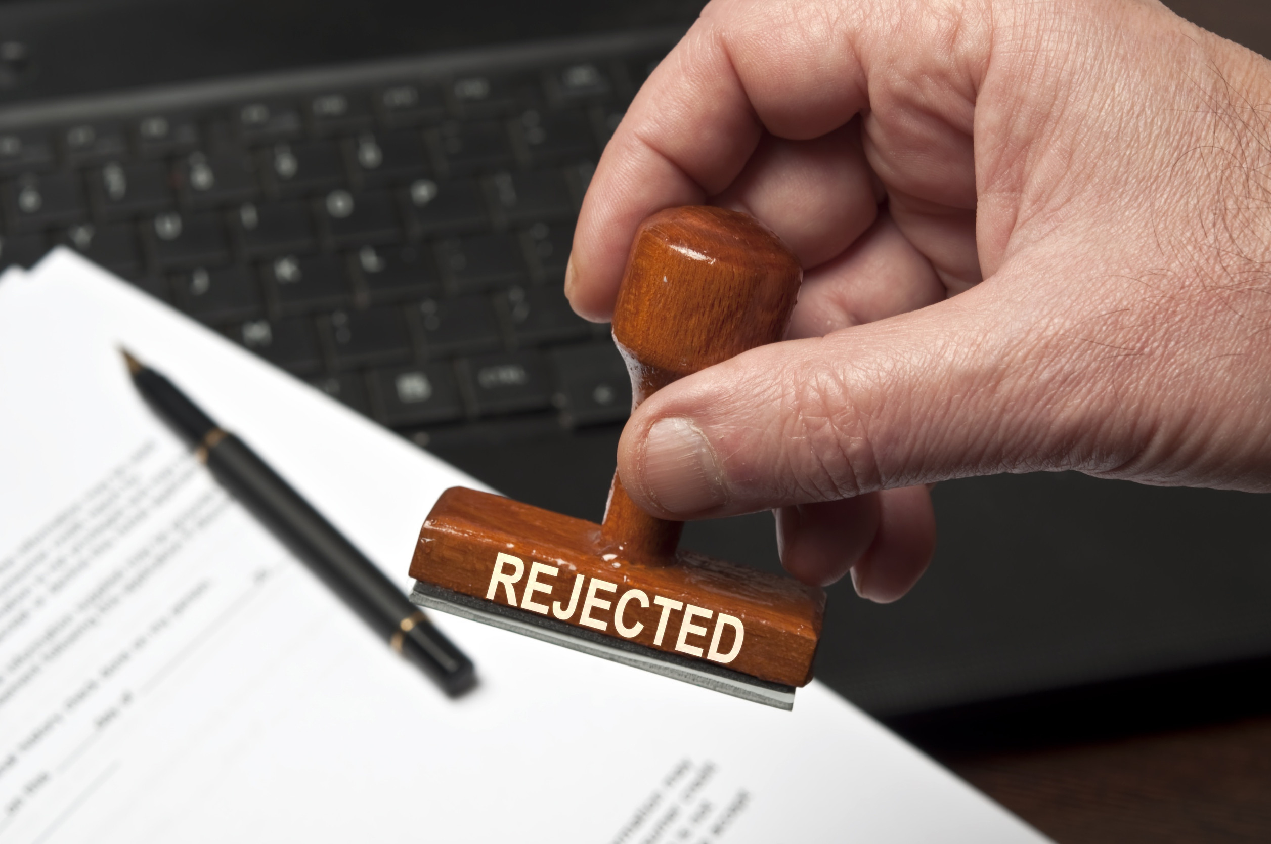 Rejected Stamp In Male Hand