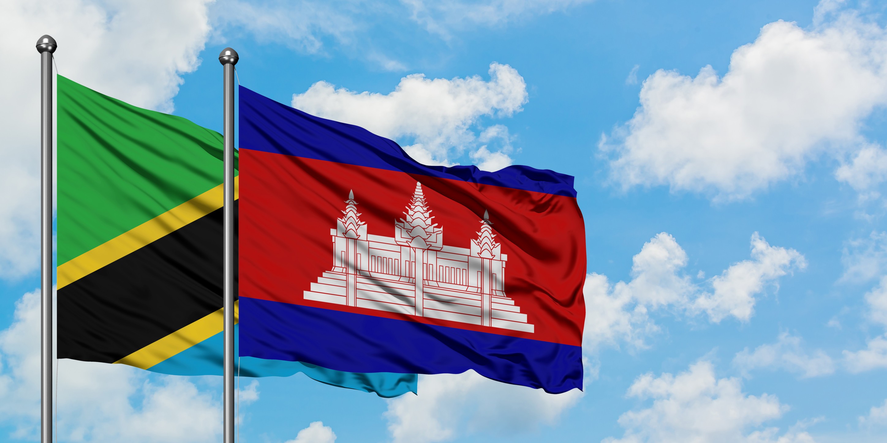 Tanzania And Cambodia Flag Waving In The Wind