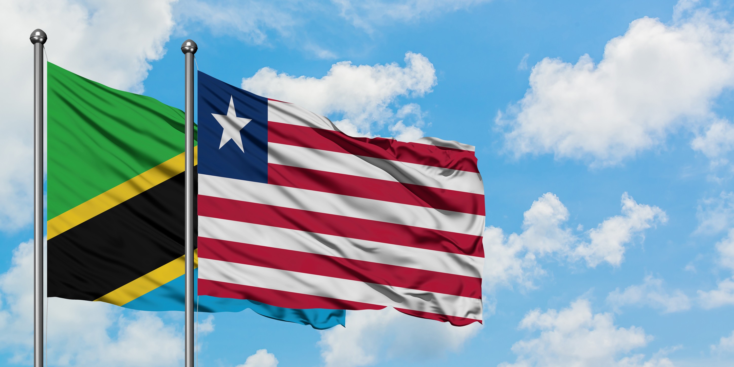 Tanzania And Liberia Flag Waving