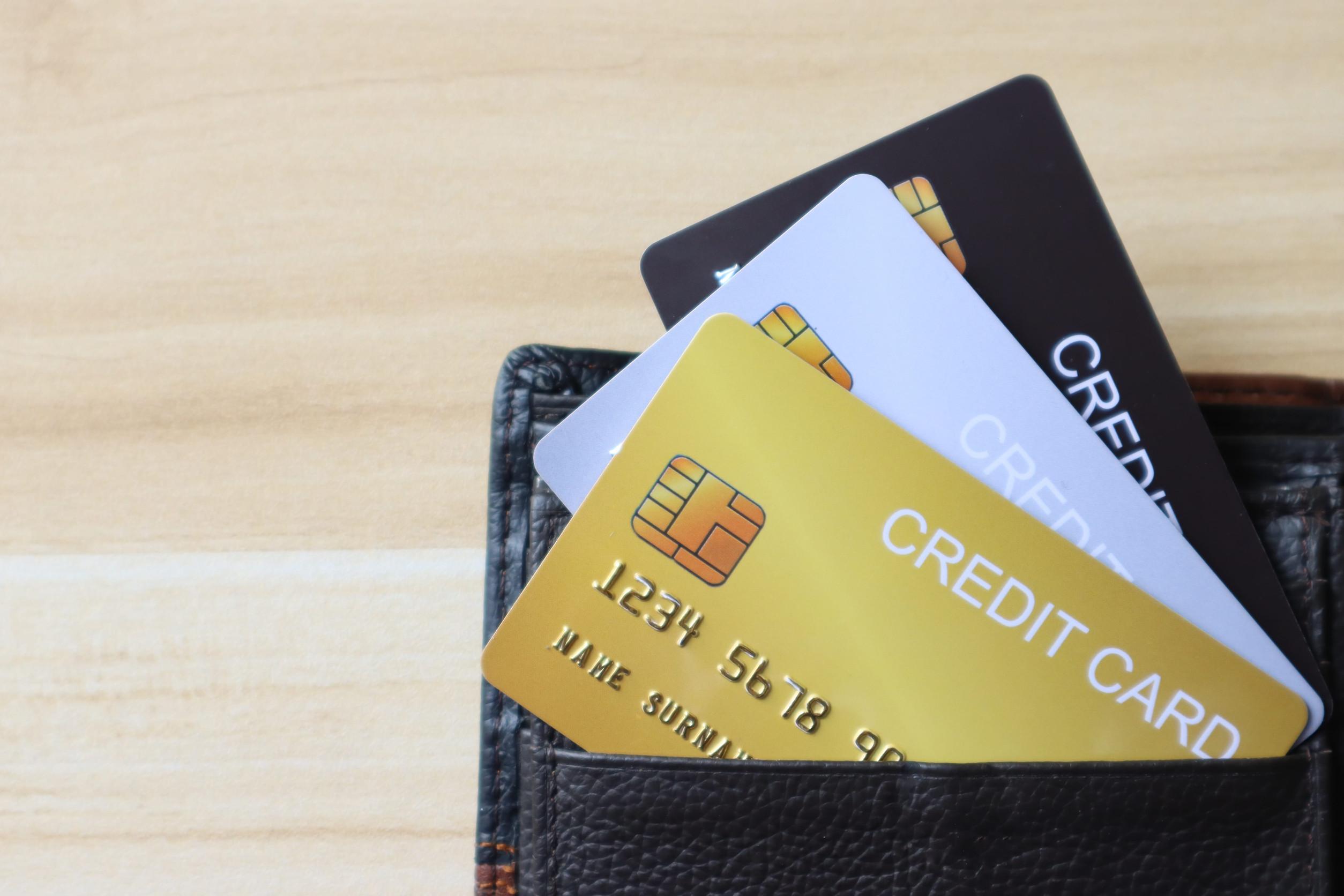 Three Credit Cards Inside The Wallet