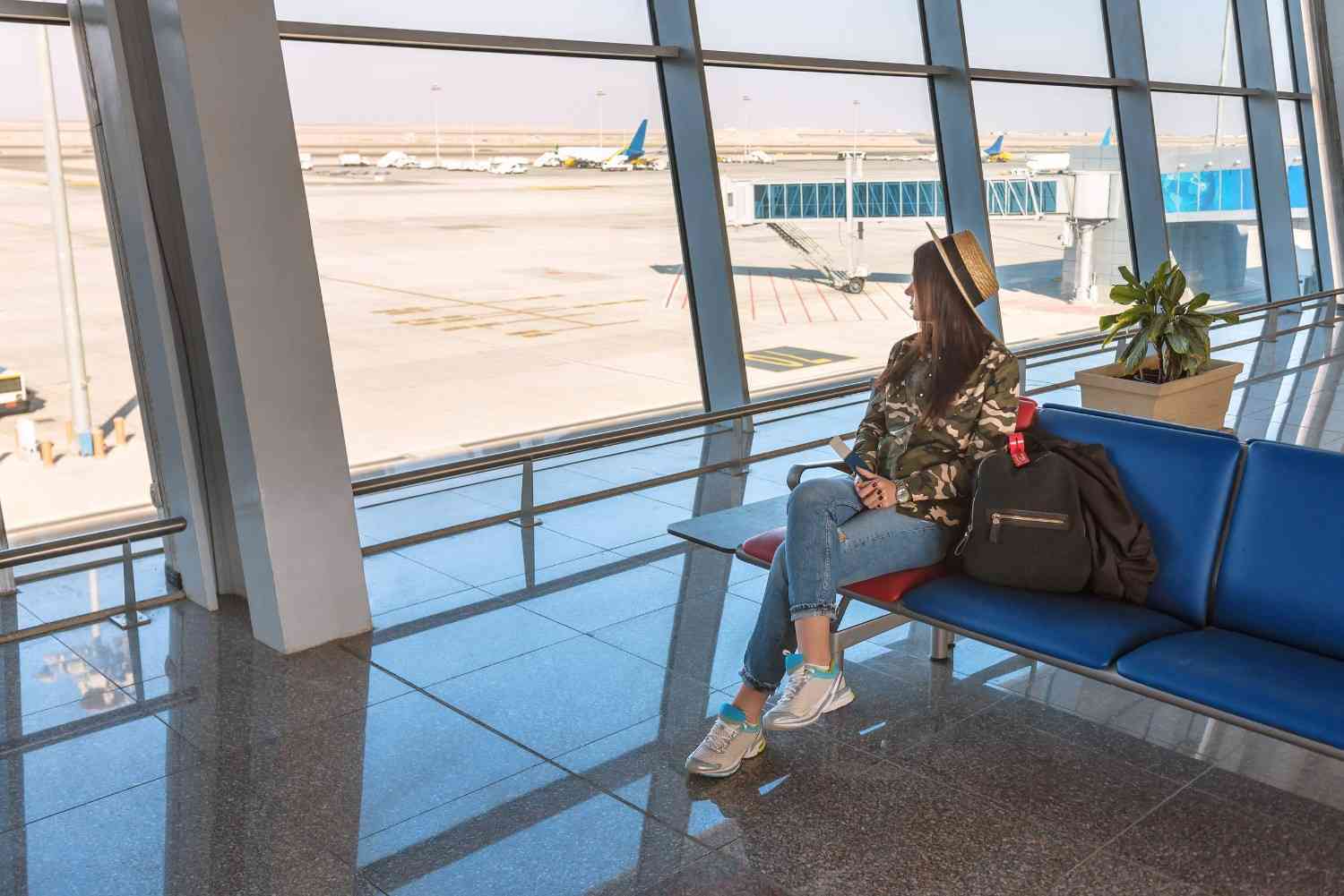 Tourists Waiting For A Flight At The Airport