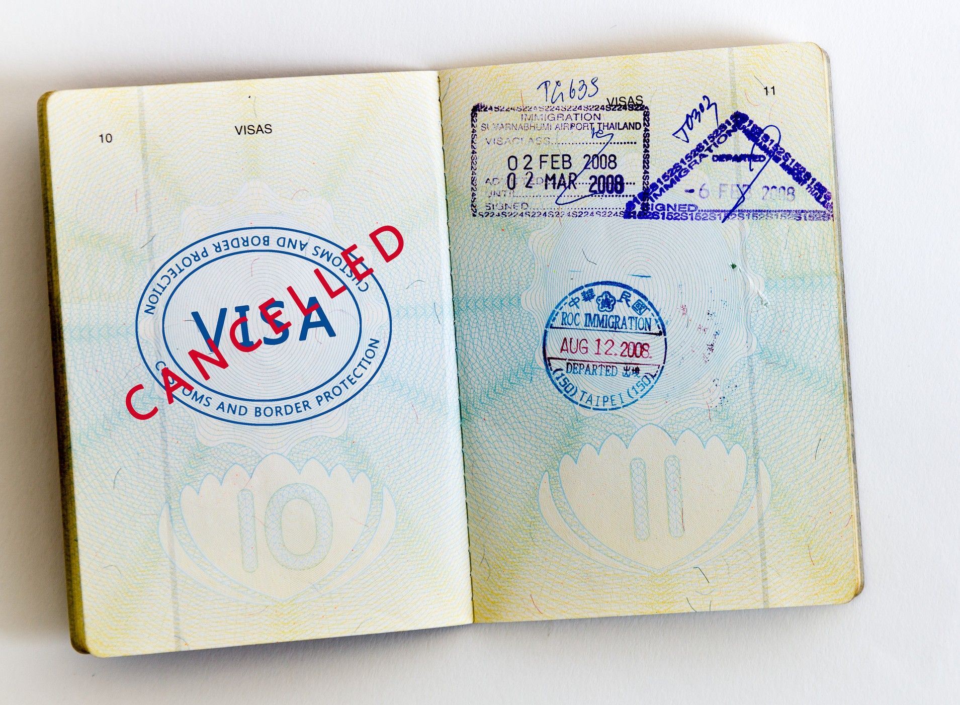 Visa Cancelled And Customs Stamps In Passport